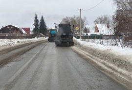 В Омском районе продолжается уборка дорог от снега
