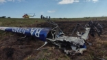 Обнародованы страшные кадры с места крушения вертолета под управлением омского биатлониста Малиновского