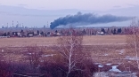 Над Омском заметили столб черного дыма
